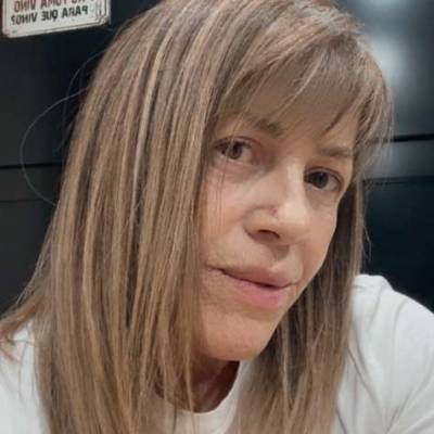  Mujer de 58 años Moreno