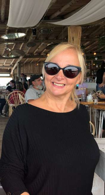 Conocer mujer de 50 años que vive en Hurlingham 